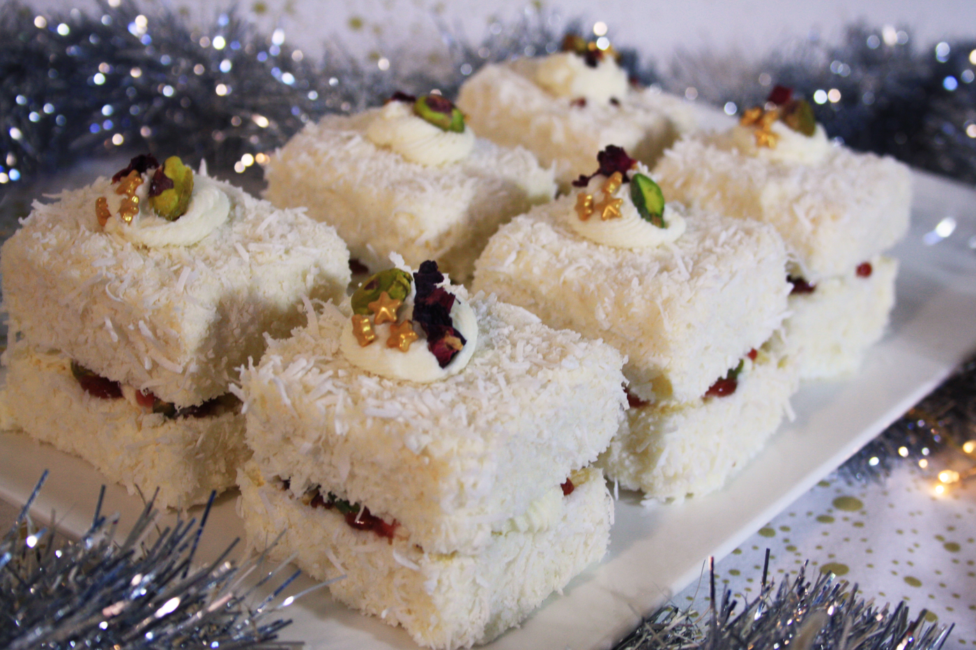 White Christmas Lamingtons (with Pistachios and Cranberries)