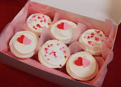 My Little Cupcake Vanilla Vegan Heart Cupcakes hand-iced with white vegan buttercream icing & decorated with adorable edible pink and red vegan love hearts